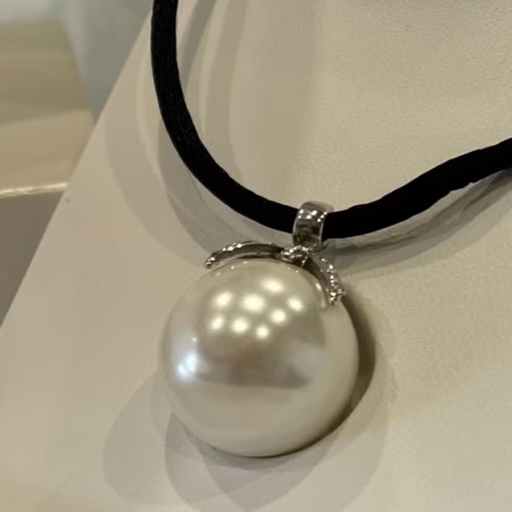 Vintage Misaki Pearl Pendant on satin string.